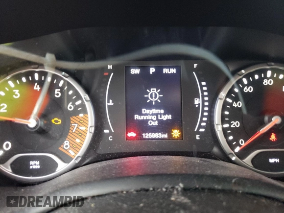 2020 Jeep Renegade Jeepster z VIN ZACNJAAB7LPL00686, wystawiony jako Copart lot #73235514 z przebiegiem 125 983 mil mil oraz Szkoda całkowita • Salvage title. Historia ofert i sprzedaży dostępna na DreamBid. Obrazek 9.