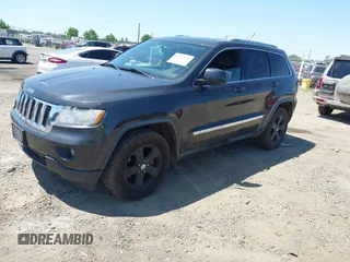 2011 Jeep Grand Cherokee Laredo with VIN 1J4RR4GG7BC715778, listed as a IAAI auction lot 42313636 with 249,209 mi miles and . Bid and sale history available at DreamBid. Image 2.