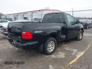 2001 Ford F-150 XL with VIN 2FTZF07211CA54107, listed as a IAAI auction lot 41450483 with 153,699 mi miles. Bid and sale history available at carsss.com. Image 4.