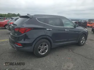 2017 Hyundai Santa Fe 2.4L with VIN 5NMZUDLB1HH028028, listed as a Copart auction lot 64431895 with Not provided miles and Salvage title. Bid and sale history available at DreamBid. Image 3.