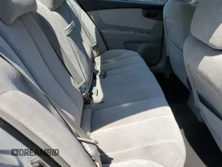 2008 Kia Optima LX z VIN KNAGE123185190108, wystawiony jako Copart lot #59364195 z przebiegiem 131 344 mil mil oraz Szkoda całkowita • Salvage title. Historia ofert i sprzedaży dostępna na DreamBid. Obrazek 10.