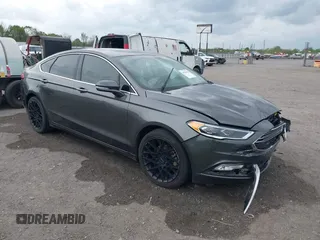 2018 Ford Fusion Titanium z VIN 3FA6P0K9XJR160993, wystawiony jako IAAI lot #41938148 z przebiegiem 137 410 mil mil oraz . Historia ofert i sprzedaży dostępna na DreamBid. Obrazek 1.