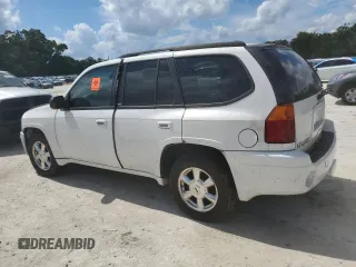 2005 GMC Envoy SLT with VIN 1GKDT13S052311455, listed as a Copart auction lot 73635434 with Not Provided miles and Salvage Title. Bid and sale history available at DreamBid. Image 2.