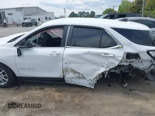 2022 Chevrolet Equinox LT z VIN 3GNAXJEV9NL132136, wystawiony jako IAAI lot #41976899 z przebiegiem 94 235 mil mil oraz . Historia ofert i sprzedaży dostępna na DreamBid. Obrazek 14.