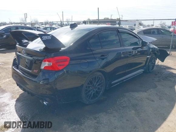 2015 Subaru WRX STI with VIN JF1VA2L68F9824207, listed as a IAAI auction lot 41637409 with 95,332 mi miles and . Bid and sale history available at DreamBid. Image 4.