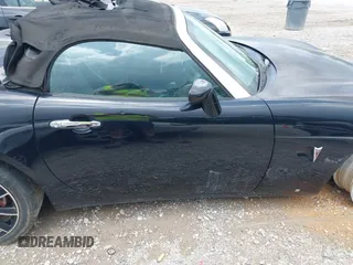 2007 Pontiac Solstice GXP z VIN 1G2MG35X17Y125299, wystawiony jako IAAI lot #42168624 z przebiegiem 123 526 mil mil oraz . Historia ofert i sprzedaży dostępna na DreamBid. Obrazek 13.