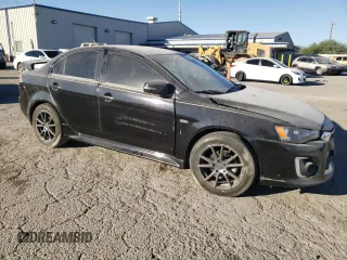 2016 Mitsubishi Lancer ES with VIN JA32U2FU1GU010590, listed as a Copart auction lot 77040544 with 27,616 mi miles and Salvage Title. Bid and sale history available at carsss.com. Image 4.