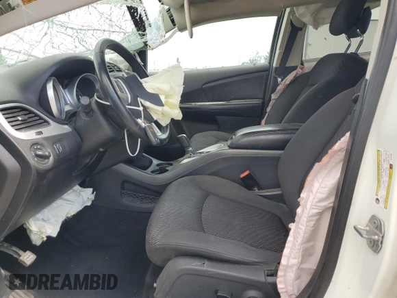 2018 Dodge Journey SXT with VIN 3C4PDDBG6JT141759, listed as a Copart auction lot 53974645 with 142,335 mi miles and Salvage title. Bid and sale history available at DreamBid. Image 7.
