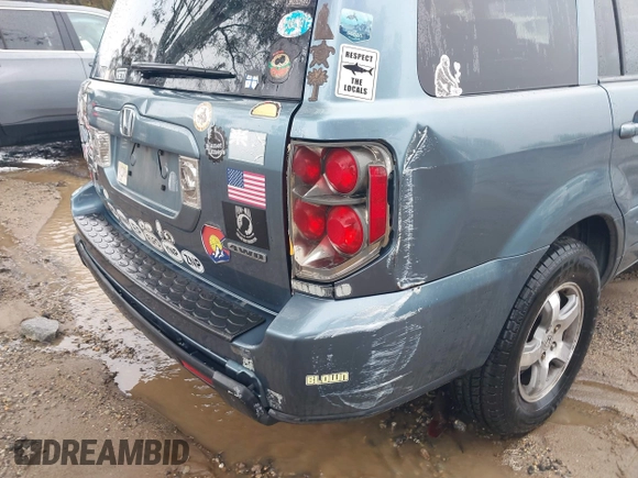 2007 Honda Pilot EX with VIN 2HKYF18437H528868, listed as a IAAI auction lot 41762030 with 203,212 mi miles. Bid and sale history available at carsss.com. Image 12.