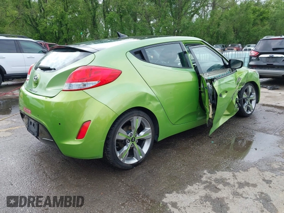 2012 Hyundai Veloster w/Gray Int with VIN KMHTC6AD6CU082432, listed as a IAAI auction lot 42121082 with 153,487 mi miles and . Bid and sale history available at DreamBid. Image 4.