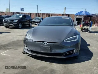 2019 Tesla Model S 75D with VIN 5YJSA1E2XKF305595, listed as a Copart auction lot 51838965 with Not provided miles and Salvage title. Bid and sale history available at DreamBid. Image 11.