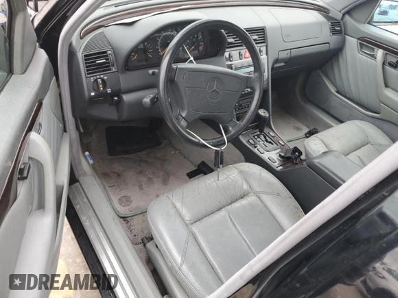 1997 Mercedes-Benz C z VIN WDBHA23EXVF560999, wystawiony jako Copart lot #74100944 z przebiegiem Nie podano mil oraz Nie do naprawy • Non repairable. Historia ofert i sprzedaży dostępna na DreamBid. Obrazek 8.