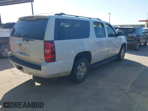2011 Chevrolet Suburban LT with VIN 1GNSCJE06BR309881, listed as a IAAI auction lot 42577452 with 254,073 mi miles and . Bid and sale history available at DreamBid. Image 4.