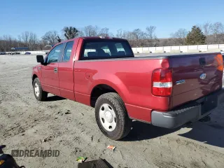 2007 Ford F-150 XL with VIN 1FTPX12V57KC72793, listed as a Copart auction lot 43690065 with 152,665 mi miles and Salvage title. Bid and sale history available at DreamBid. Image 2.