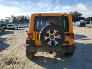2012 Jeep Wrangler Rubicon with VIN 1C4BJWCG2CL135789, listed as a Copart auction lot 42556365 with 121,908 mi miles and Salvage title. Bid and sale history available at DreamBid. Image 6.