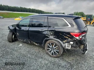 2019 Honda Pilot Elite with VIN 5FNYF6H05KB071031, listed as a Copart auction lot 60777585 with 96,155 mi miles and Salvage title. Bid and sale history available at DreamBid. Image 2.