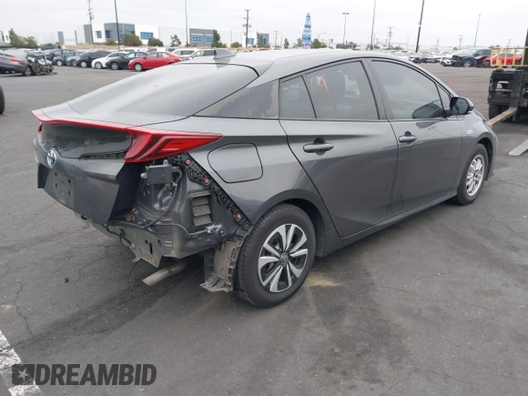 2017 Toyota Prius Plus with VIN JTDKARFP6H3058607, listed as a IAAI auction lot 42074537 with 181,991 mi miles and . Bid and sale history available at DreamBid. Image 4.