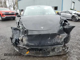 2024 Tesla Model Y Long Range with VIN 7SAYGDEE2RF131085, listed as a Copart auction lot 50171055 with Not Provided miles and Salvage Title. Bid and sale history available at DreamBid. Image 5.