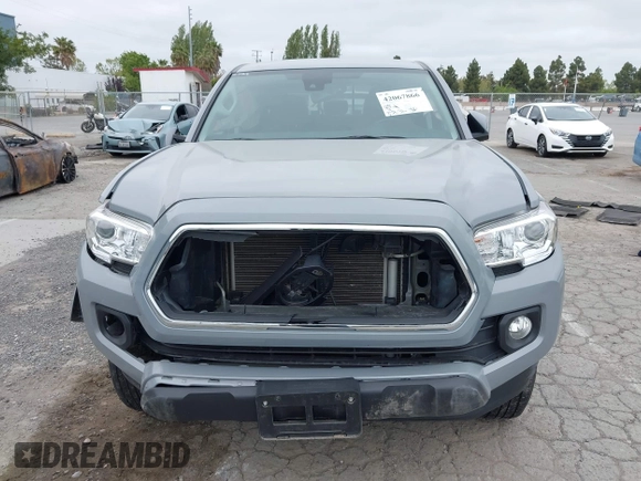 2021 Toyota Tacoma SR z VIN 3TMCZ5AN1MM422937, wystawiony jako IAAI lot #42067866 z przebiegiem 33 232 mil mil oraz . Historia ofert i sprzedaży dostępna na DreamBid. Obrazek 12.