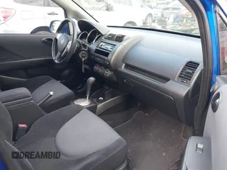 2007 Honda Fit Sport with VIN JHMGD38647S056047, listed as a IAAI auction lot 41956635 with 163,920 mi miles. Bid and sale history available at carsss.com. Image 5.