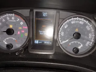 2023 Toyota Tacoma 4WD SR with VIN 3TMCZ5AN4PM625017, listed as a IAAI auction lot 41207111 with 38,582 mi miles. Bid and sale history available at carsss.com. Image 7.