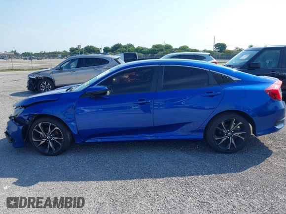 2019 Honda Civic Sport with VIN 19XFC2F83KE014463, listed as a IAAI auction lot 41439533 with 84,379 mi miles and . Bid and sale history available at DreamBid. Image 14.
