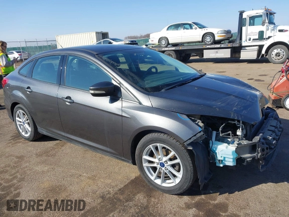 2016 Ford Focus SE with VIN 1FADP3F21GL212718, listed as a IAAI auction lot 41785985 with 101,198 mi miles. Bid and sale history available at carsss.com. Image 1.