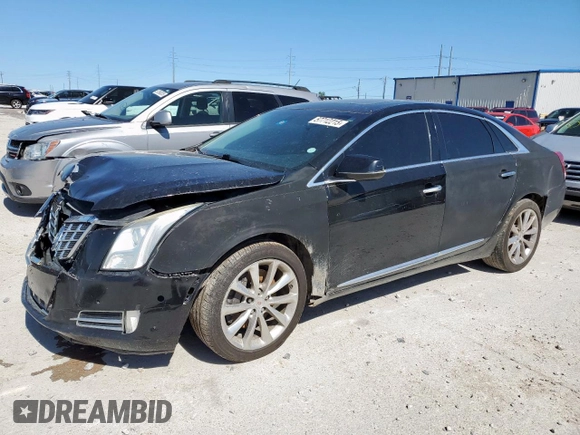 2014 Cadillac XTS Luxury z VIN 2G61M5S39E9302853, wystawiony jako Copart lot #57712215 z przebiegiem 180 886 mil mil oraz Czysty tytuł • Clean title. Historia ofert i sprzedaży dostępna na DreamBid. Obrazek 1.