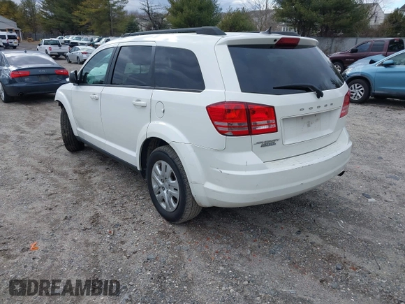 2016 Dodge Journey SE with VIN 3C4PDCAB1GT104630, listed as a IAAI auction lot 41731485 with 233,992 mi miles. Bid and sale history available at carsss.com. Image 3.