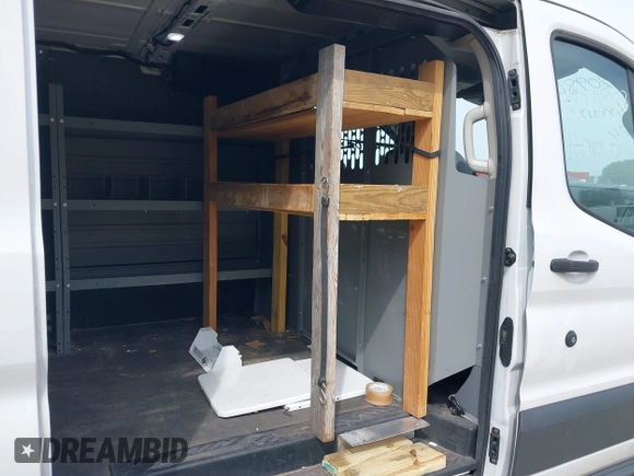 2018 Ford Transit with VIN 1FTYE1YM8JKB52082, listed as a IAAI auction lot 42098033 with 243,181 mi miles. Bid and sale history available at carsss.com. Image 8.