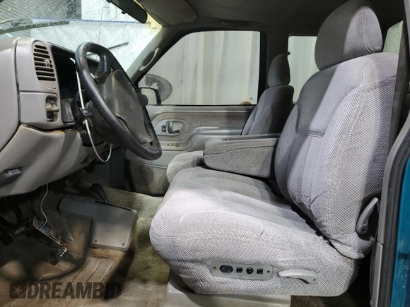 1995 GMC Sierra 1500 z VIN 2GTEK19K5S1509969, wystawiony jako Copart lot #42945545 z przebiegiem 361 334 mil mil oraz Szkody całkowita. Historia ofert i sprzedaży dostępna na DreamBid. Obrazek 7.