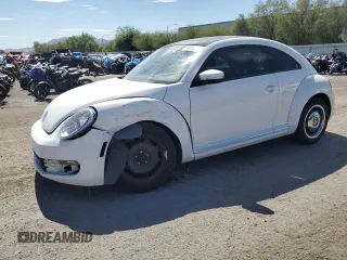 2012 Volkswagen Beetle 2.5L PZEV with VIN 3VWJP7AT7CM632719, listed as a Copart auction lot 64264055 with 74,468 mi miles and Salvage title. Bid and sale history available at DreamBid. Image 1.