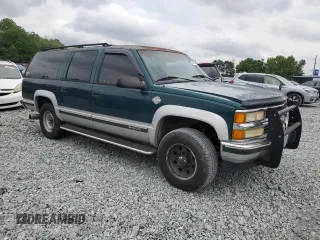 1995 Chevrolet Suburban with VIN 1GNGK16FXSJ380916, listed as a Copart auction lot 57666685 with 269,323 mi miles and Salvage title. Bid and sale history available at DreamBid. Image 4.