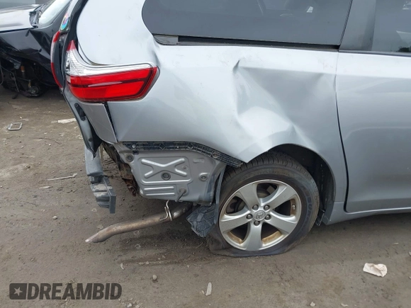 2015 Toyota Sienna LE AAS with VIN 5TDKK3DC0FS588089, listed as a IAAI auction lot 42501791 with 190,322 mi miles and . Bid and sale history available at DreamBid. Image 6.