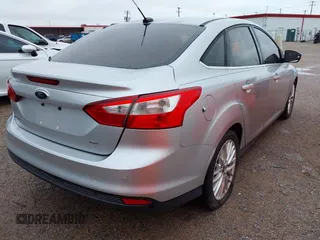 2012 Ford Focus SEL with VIN 1FAHP3H22CL102110, listed as a IAAI auction lot 41963966 with 151,538 mi miles. Bid and sale history available at carsss.com. Image 4.