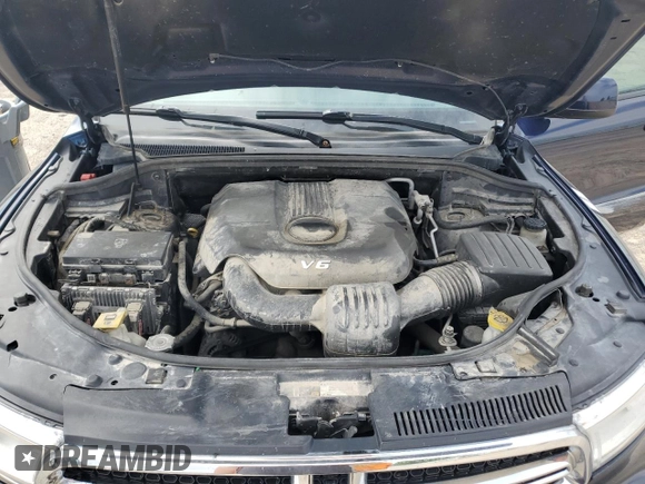 2014 Dodge Durango SXT z VIN 1C4RDJAG2EC971178, wystawiony jako Copart lot #58758515 z przebiegiem 197 533 mil mil oraz Nie do naprawy • Non repairable. Historia ofert i sprzedaży dostępna na DreamBid. Obrazek 11.