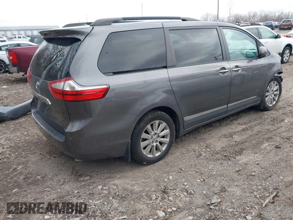 2015 Toyota Sienna Ltd with VIN 5TDDK3DCXFS100341, listed as a IAAI auction lot 41245558 with 114,854 mi miles. Bid and sale history available at carsss.com. Image 4.