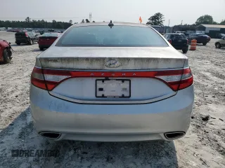 2013 Hyundai Azera z VIN KMHFG4JG9DA252768, wystawiony jako Copart lot #59143035 z przebiegiem 118 260 mil mil oraz Czysty tytuł • Clean title. Historia ofert i sprzedaży dostępna na DreamBid. Obrazek 6.