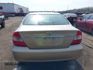 2004 Toyota Camry LE with VIN 4T1BF30K94U587836, listed as a IAAI auction lot 41714277 with 211,893 mi miles and . Bid and sale history available at carsss.com. Image 16.