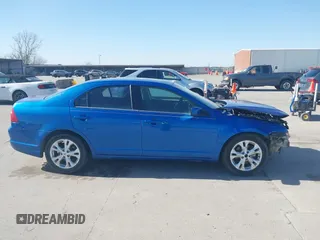 2012 Ford Fusion SE z VIN 3FAHP0HA9CR395009, wystawiony jako IAAI lot #41855650 z przebiegiem 178 901 mil mil oraz . Historia ofert i sprzedaży dostępna na DreamBid. Obrazek 14.