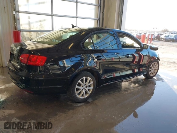 2012 Volkswagen Jetta Sedan SE w/Convenience & Sunroof with VIN 3VWDX7AJ5CM469743, listed as a IAAI auction lot 41028104 with 1 mi miles. Bid and sale history available at carsss.com. Image 4.
