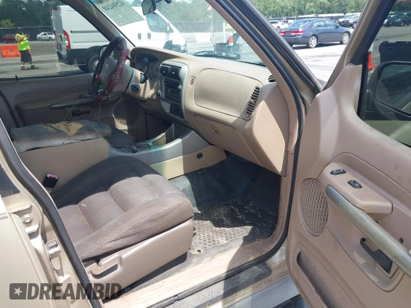 2001 Ford Explorer Sport Trac with VIN 1FMZU67E51UC84439, listed as a IAAI auction lot 42504240 with 290,657 mi miles and . Bid and sale history available at DreamBid. Image 5.