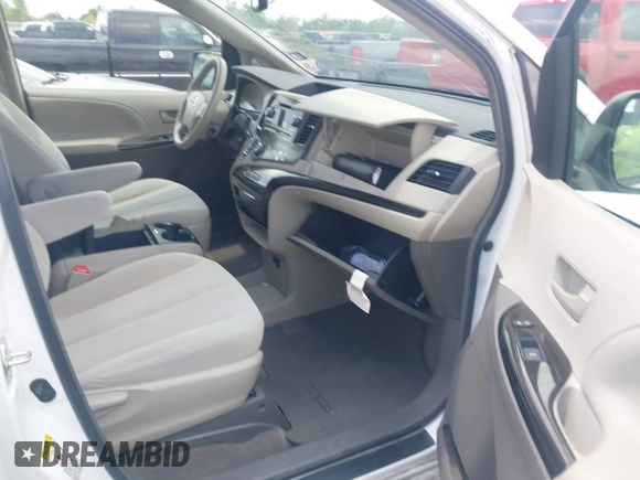 2014 Toyota Sienna LE AAS with VIN 5TDKK3DC0ES525654, listed as a IAAI auction lot 42153582 with 71,258 mi miles and . Bid and sale history available at carsss.com. Image 5.