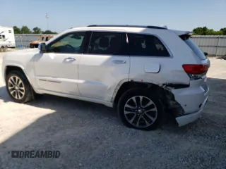 2018 Jeep Grand Cherokee Overland z VIN 1C4RJFCG4JC425589, wystawiony jako Copart lot #61775775 z przebiegiem 102 040 mil mil oraz Szkoda całkowita • Salvage title. Historia ofert i sprzedaży dostępna na DreamBid. Obrazek 2.
