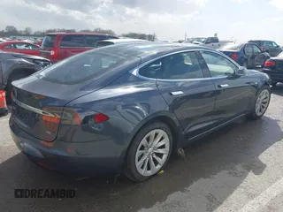 2016 Tesla Model S 70 with VIN 5YJSA1E14GF157118, listed as a IAAI auction lot 41794381 with 53,651 mi miles and . Bid and sale history available at DreamBid. Image 4.