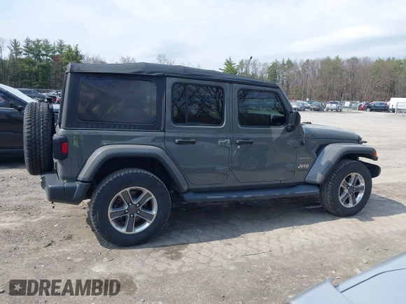 2018 Jeep Wrangler Unlimited Sahara z VIN 1C4HJXEN8JW329816, wystawiony jako IAAI lot #42055851 z przebiegiem 70 298 mil mil oraz . Historia ofert i sprzedaży dostępna na DreamBid. Obrazek 13.