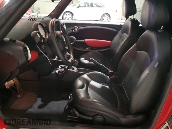 2013 MINI Convertible S with VIN WMWZP3C51DT551227, listed as a Copart auction lot 55432645 with 23,995 mi miles and Salvage Title. Bid and sale history available at DreamBid. Image 7.