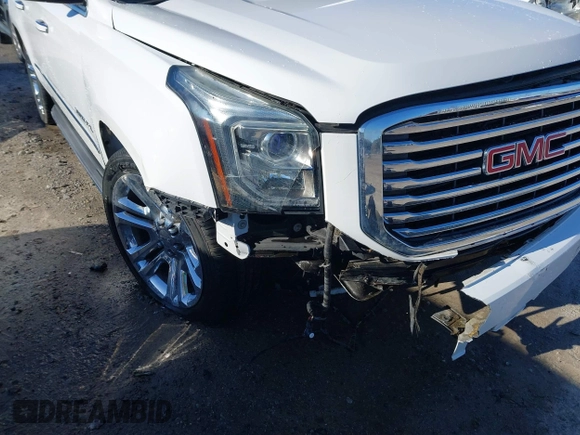 2017 GMC Yukon XL SLT z VIN 1GKS2GKC0HR207440, wystawiony jako IAAI lot #41715100 z przebiegiem 139 529 mil mil oraz . Historia ofert i sprzedaży dostępna na DreamBid. Obrazek 6.