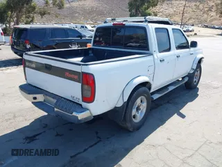 2000 Nissan Frontier XE z VIN 1N6ED27T5YC433357, wystawiony jako IAAI lot #42405160 z przebiegiem 290 620 mil mil oraz . Historia ofert i sprzedaży dostępna na DreamBid. Obrazek 4.