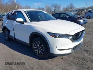 2017 Mazda CX-5 Grand Touring with VIN JM3KFBDL6H0188517, listed as a IAAI auction lot 41093178 with 98,831 mi miles. Bid and sale history available at carsss.com. Image 1.